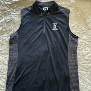 Ladies black sleeveless golf shirt